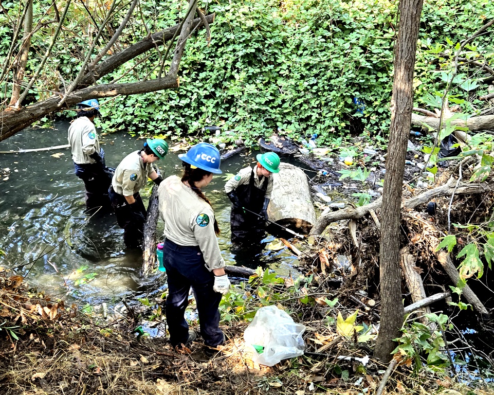 CCC removing trash prior to removing the log jam.